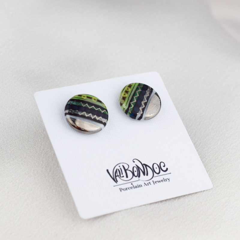 Porcelain stud earrings created and hand-painted by Vali Bondoc with high temperature ceramic dyes and gold