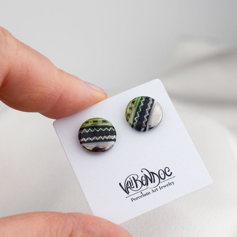 Porcelain stud earrings created and hand-painted by Vali Bondoc with high temperature ceramic dyes and platinum