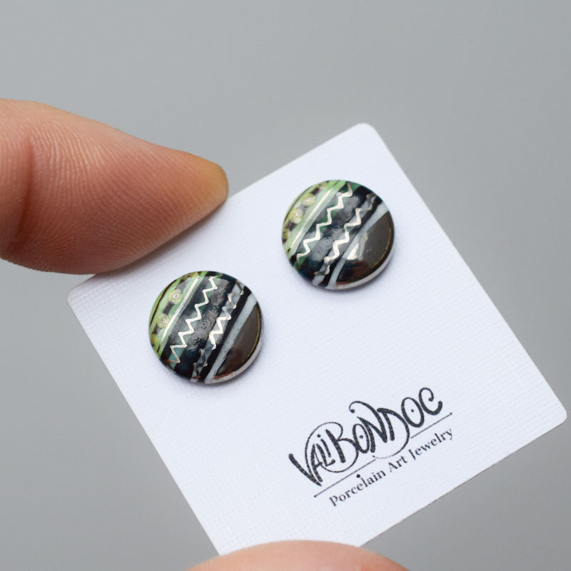 Porcelain stud earrings created and hand-painted by Vali Bondoc with high temperature ceramic dyes and gold