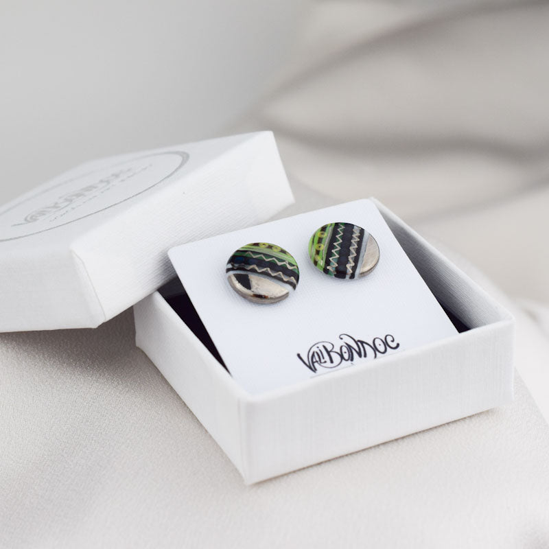 Porcelain stud earrings created and hand-painted by Vali Bondoc with high temperature ceramic dyes