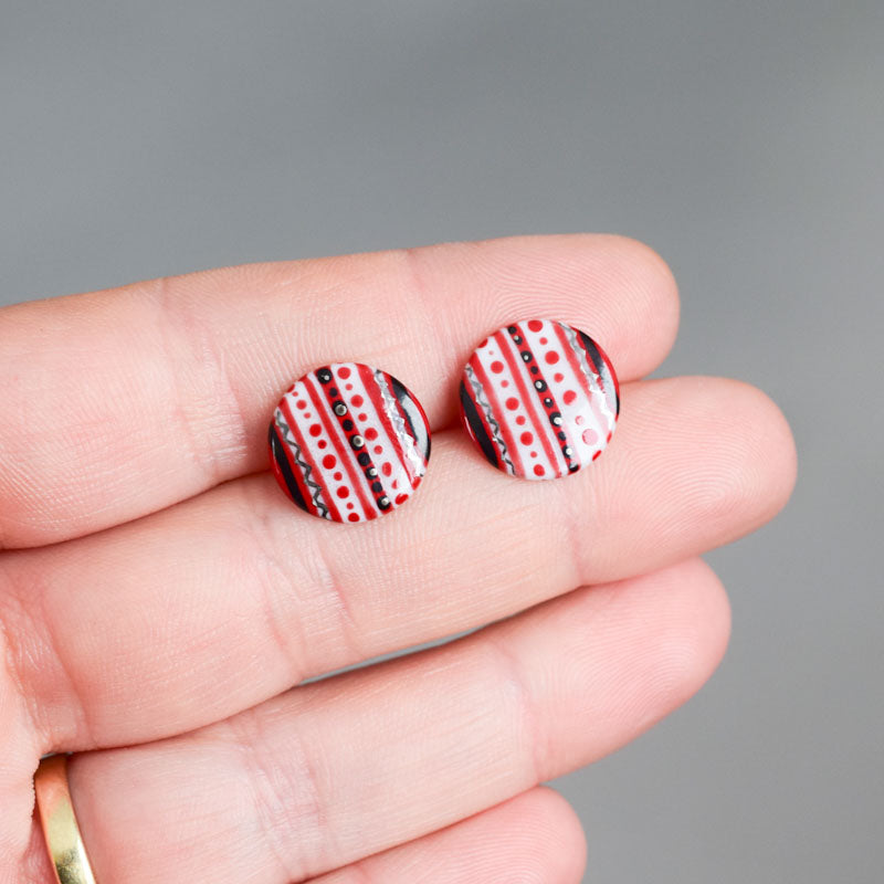 Porcelain stud earrings created and hand-painted by Vali Bondoc with high temperature ceramic dyes and gold