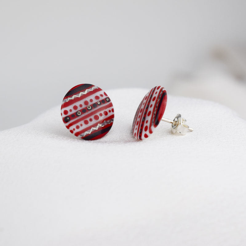 Porcelain stud earrings created and hand-painted by Vali Bondoc with high temperature ceramic dyes and platinum