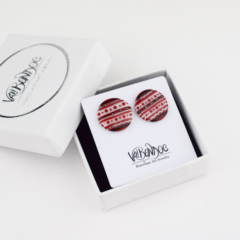 Porcelain stud earrings created and hand-painted by Vali Bondoc with high temperature ceramic dyes and gold