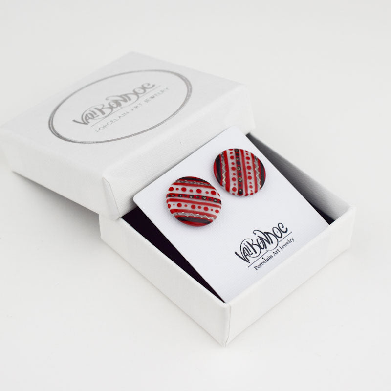 Porcelain stud earrings created and hand-painted by Vali Bondoc with high temperature ceramic dyes and platinum