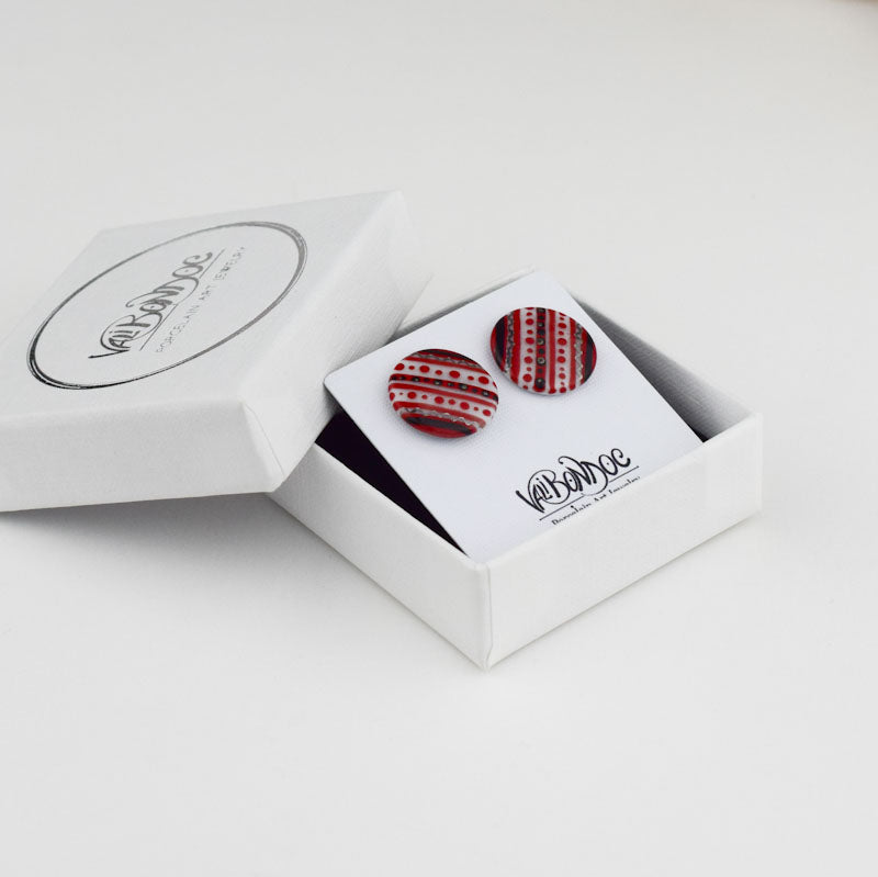 Porcelain stud earrings created and hand-painted by Vali Bondoc with high temperature ceramic dyes and gold