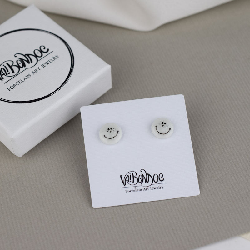 Porcelain stud earrings created and hand-painted by Vali Bondoc with high temperature ceramic dyes