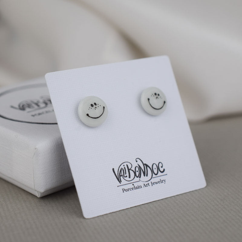 Porcelain stud earrings created and hand-painted by Vali Bondoc with high temperature ceramic dyes