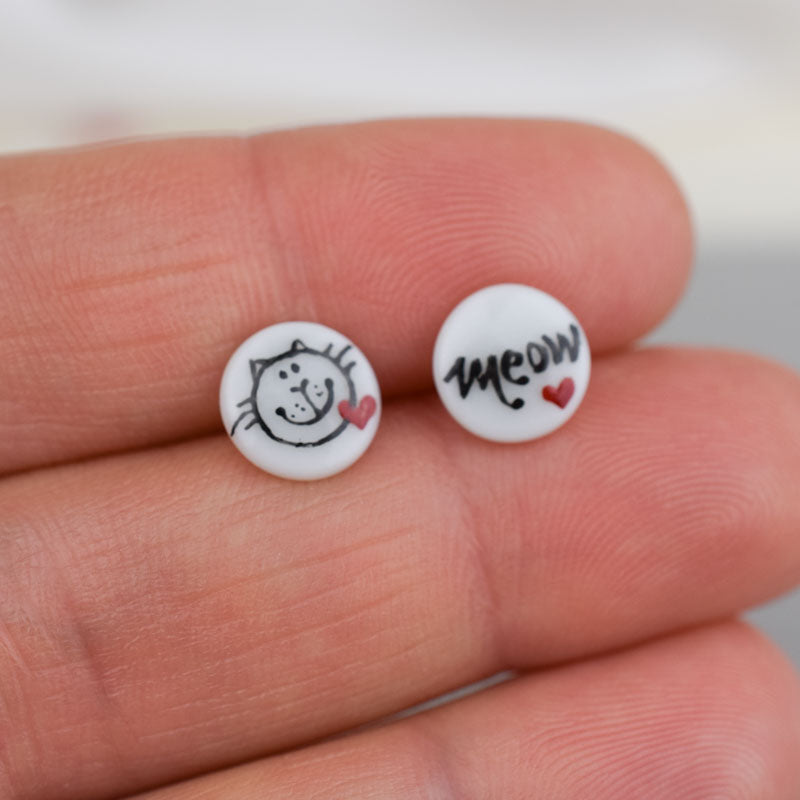 Porcelain stud earrings created and hand-painted by Vali Bondoc with high temperature ceramic dyes