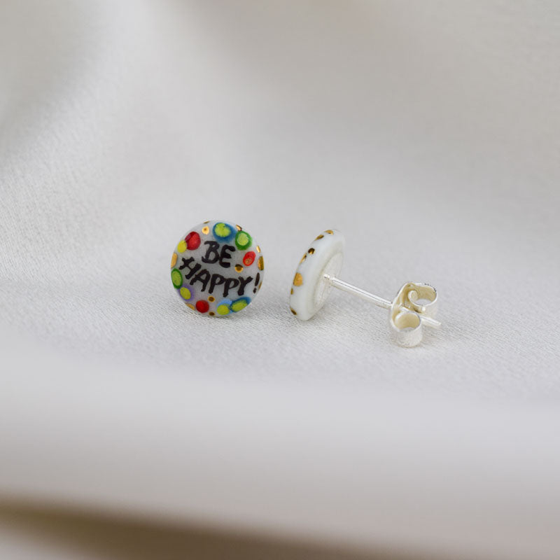 Porcelain stud earrings created and hand-painted by Vali Bondoc with high temperature ceramic dyes and gold