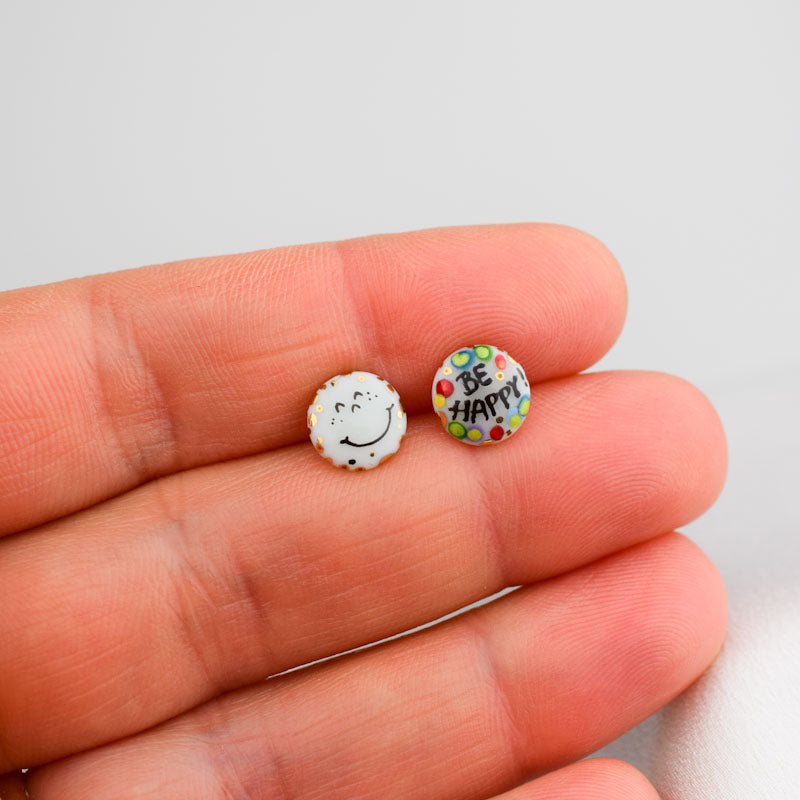 Porcelain stud earrings created and hand-painted by Vali Bondoc with high temperature ceramic dyes