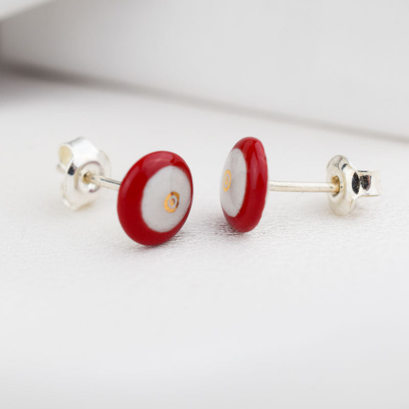 Porcelain stud earrings created and hand-painted by Vali Bondoc with high temperature ceramic dyes and gold
