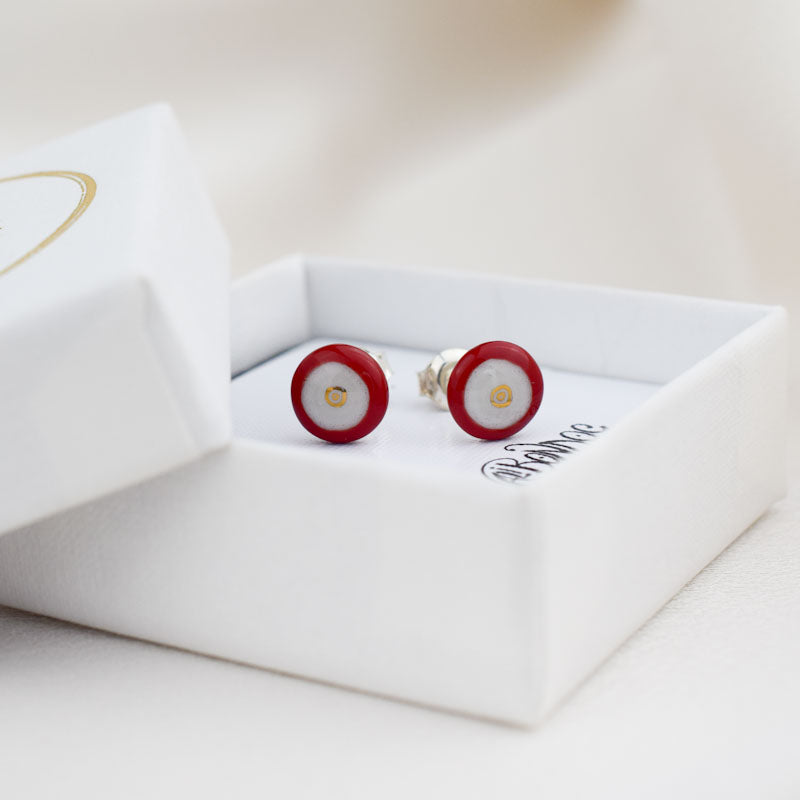 Porcelain stud earrings created and hand-painted by Vali Bondoc with high temperature ceramic dyes and gold
