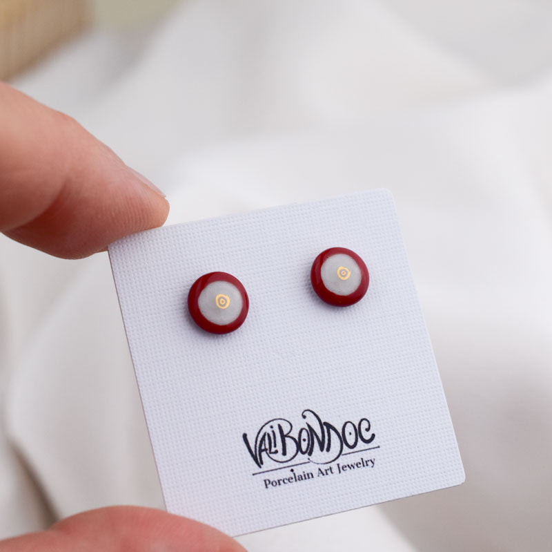 Porcelain stud earrings created and hand-painted by Vali Bondoc with high temperature ceramic dyes and gold