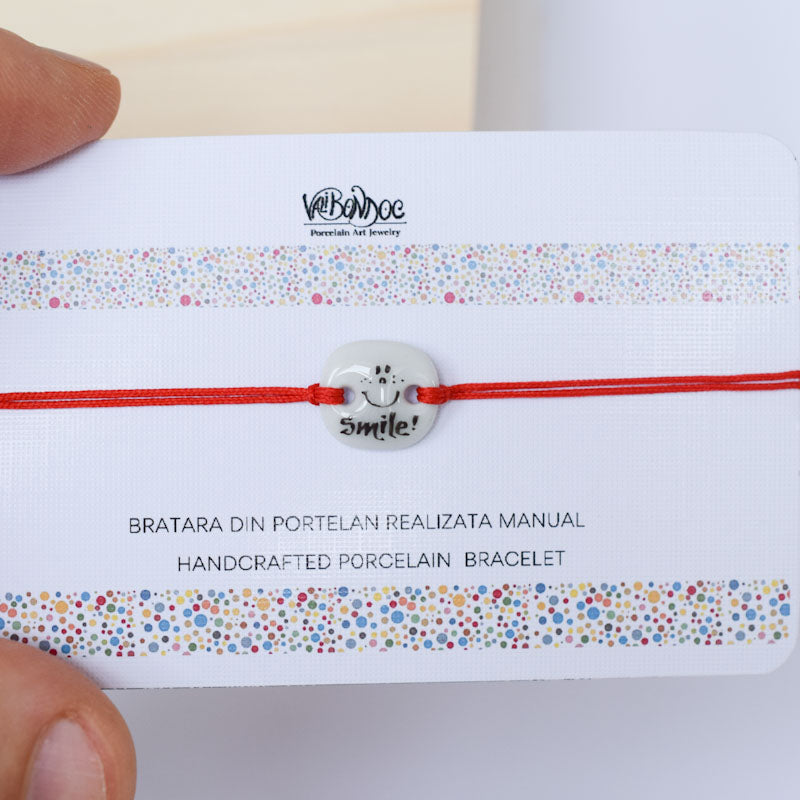 Smile. Porcelain bracelet handmade and hand painted by Vali Bondoc