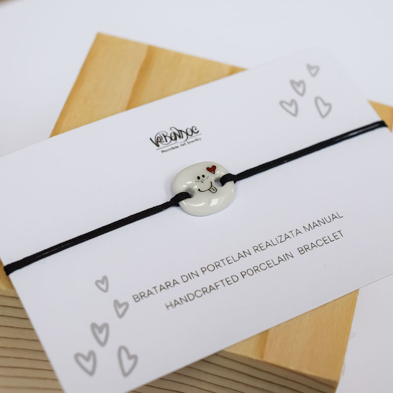 Smiley face with heart .Porcelain bracelet handmade and hand painted by Vali Bondoc