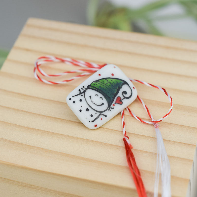 Little porcelain brooch modeled and painted by Vali Bondoc