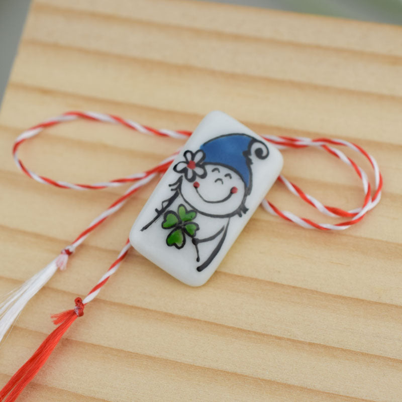 Spring Elves. Little porcelain brooch modeled and painted by Vali Bondoc