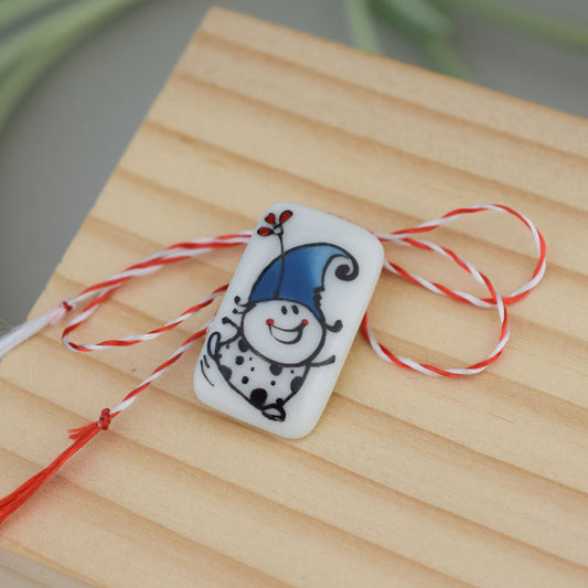 Little porcelain brooch modeled and painted by Vali Bondoc