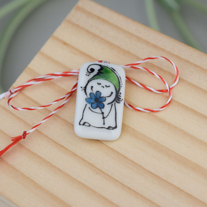 Little porcelain brooch modeled and painted by Vali Bondoc