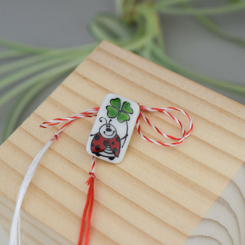 Little porcelain brooch modeled and painted by Vali Bondoc