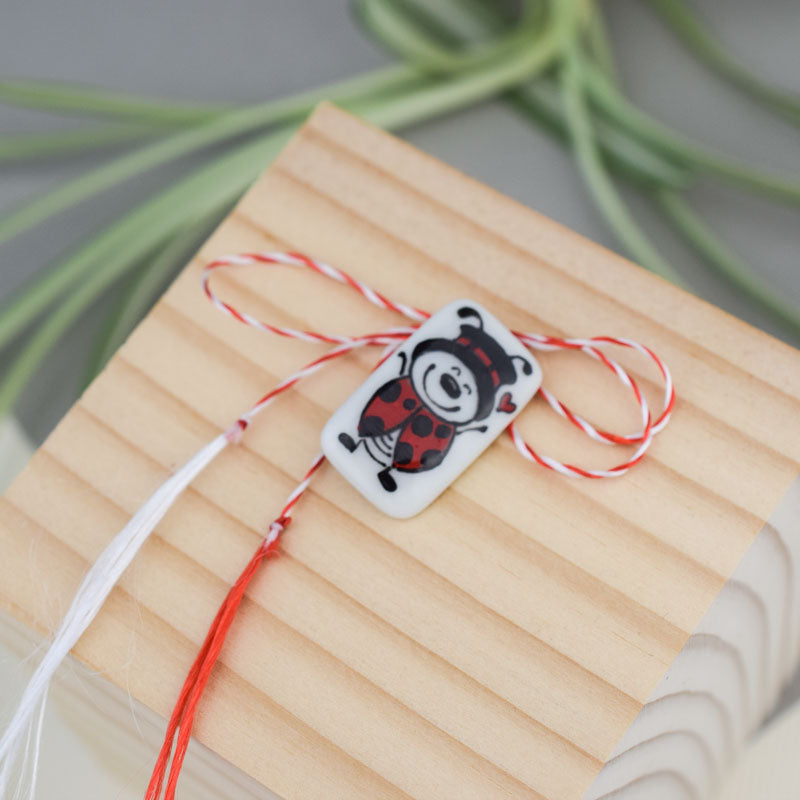 Little porcelain brooch modeled and painted by Vali Bondoc