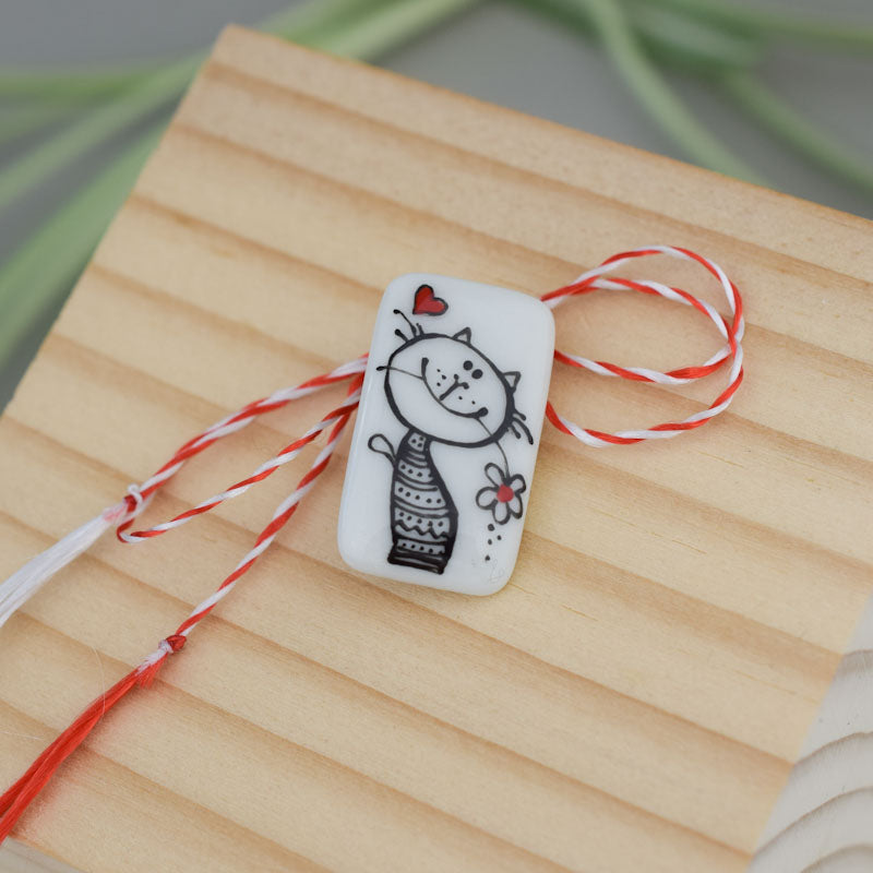 Little porcelain brooch modeled and painted by Vali Bondoc