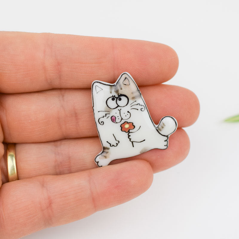 Topy cat. Porcelain brooch created and hand-painted by Vali Bondoc with high temperature ceramic dyes and colloidal gold.