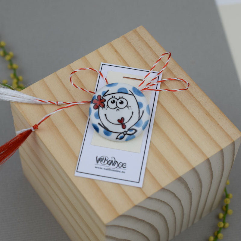 Porcelain brooch created and hand-painted by Vali Bondoc with high temperature ceramic dyes and colloidal gold.