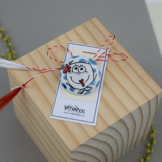 Porcelain brooch created and hand-painted by Vali Bondoc with high temperature ceramic dyes and colloidal gold.