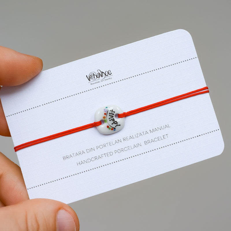 Happy moments. Porcelain bracelet handmade and hand painted by Vali Bondoc