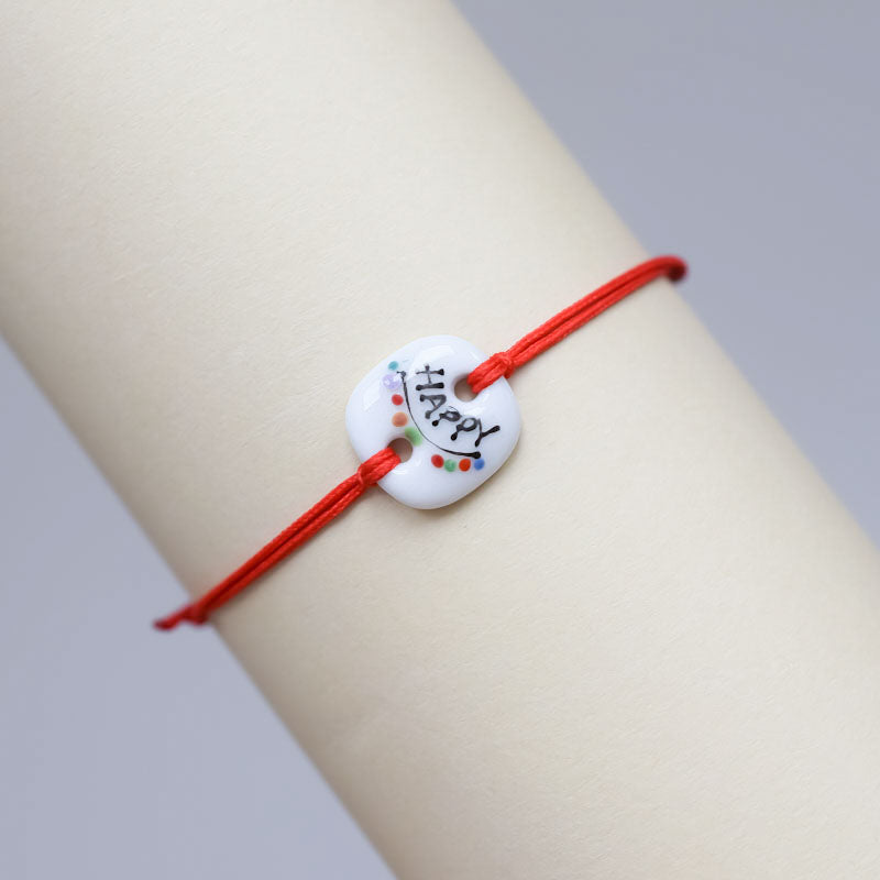 Happy moments. Porcelain bracelet handmade and hand painted by Vali Bondoc