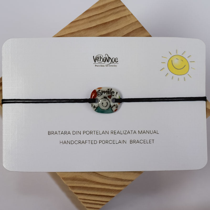 Smile. Porcelain bracelet handmade and hand painted by Vali Bondoc