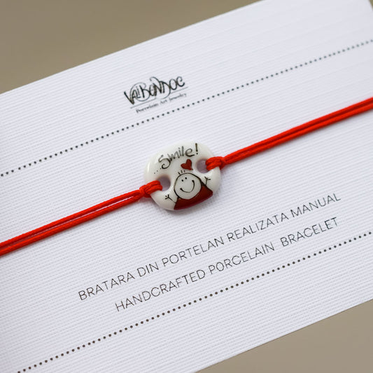 Smile. Porcelain bracelet handmade and hand painted by Vali Bondoc