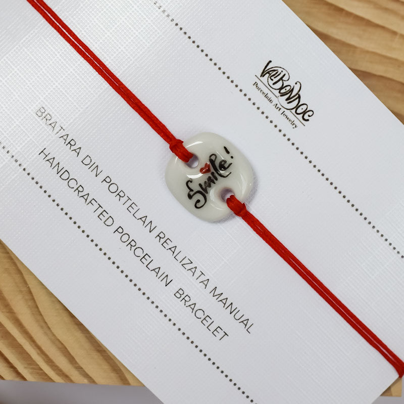 Smile. Porcelain bracelet handmade and hand painted by Vali Bondoc