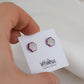 Porcelain stud earrings created and hand-painted by Vali Bondoc with high temperature ceramic dyes and colloidal gold
