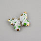 Butterfly. Porcelain brooch created and hand-painted by Vali Bondoc with high temperature ceramic dyes and colloidal gold