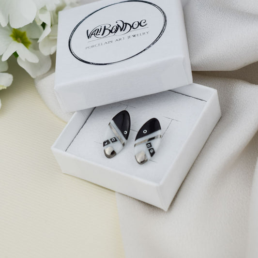 Porcelain stud earrings created and hand-painted by Vali Bondoc with high temperature ceramic dyes and colloidal platinum