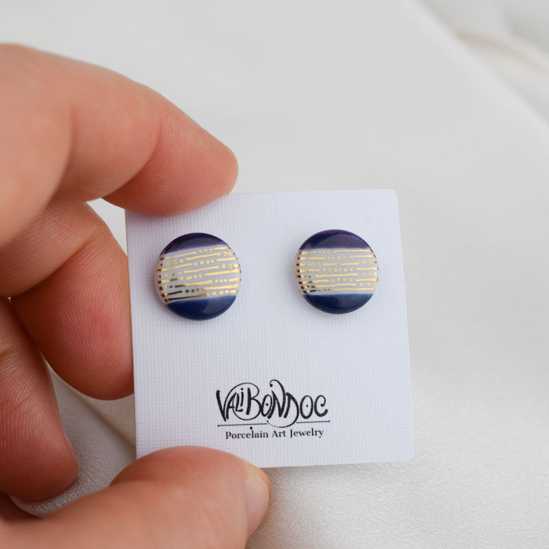 Porcelain stud earrings created and hand-painted by Vali Bondoc with high temperature ceramic dyes and gold