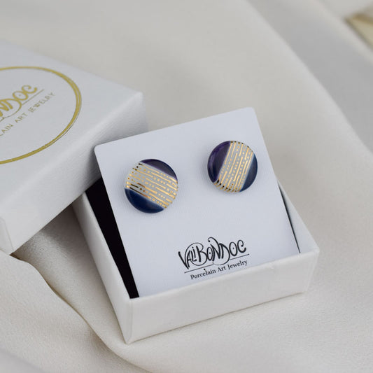 Porcelain stud earrings created and hand-painted by Vali Bondoc with high temperature ceramic dyes and gold