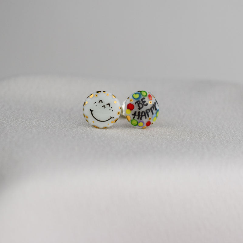 Porcelain stud earrings created and hand-painted by Vali Bondoc with high temperature ceramic dyes