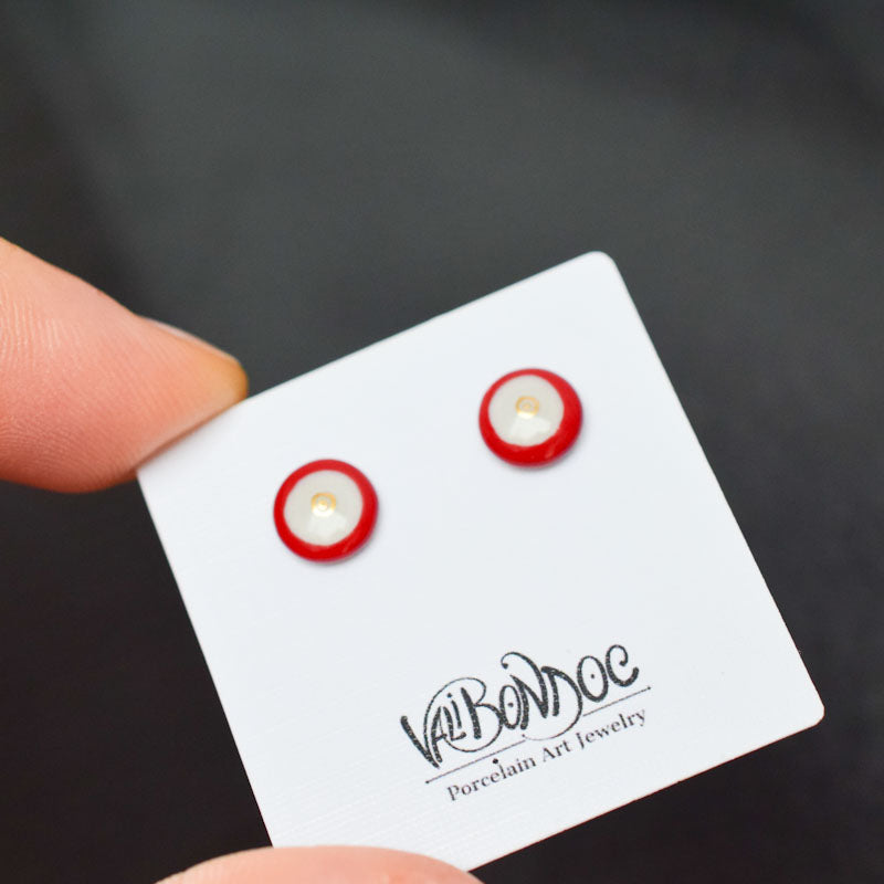 Porcelain stud earrings created and hand-painted by Vali Bondoc with high temperature ceramic dyes and gold
