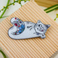 Cat. Porcelain brooch created and hand-painted by Vali Bondoc with high temperature ceramic dyes